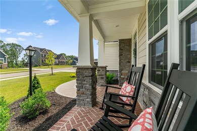 Front porch with a view to the ample front years a