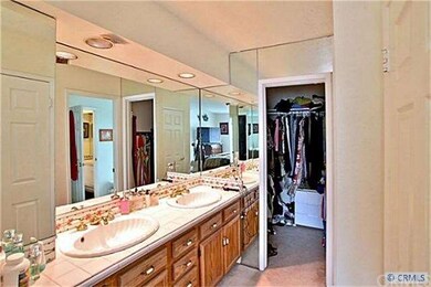 Master bath with jetted tub, dual vanities and wal