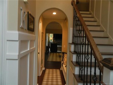Foyer has bench with storage