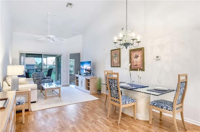 Dining room with baseboards, visible vents, light 