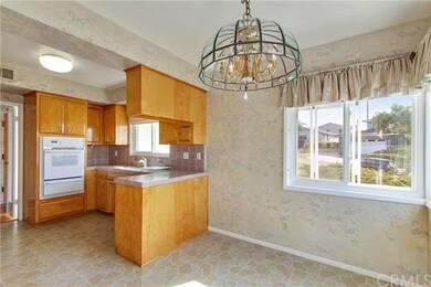 Breakfast area leading to Kitchen