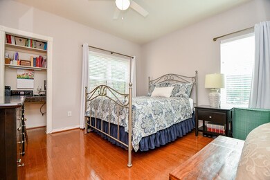 The bedroom is bathed in natural light.