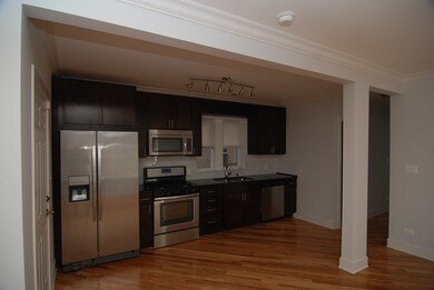 6134 N Washtenaw Ave unit 1F, Chicago, IL 60659 - photo 2