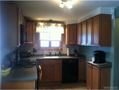 Kitchen. Updated Kitchen with Corian countertops, 
