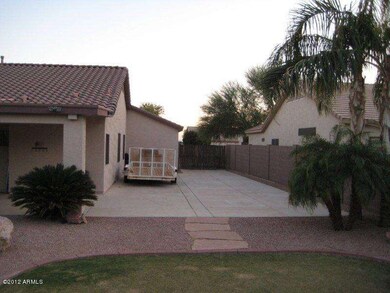 SIDE YARD VIEW WITH CONCRETE SLAB