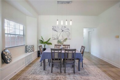 Dining space featuring tile patterned floors
