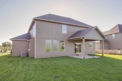 Large back yard that is level. Covered patio with 