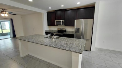 1163 Sand Torch Cir, Davenport, FL 33837 - photo 2