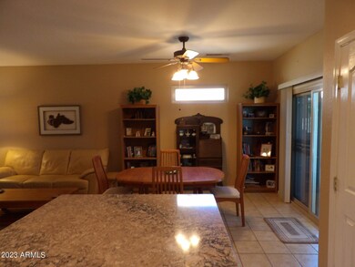 KITCHEN LOOKING AT DINING RM.