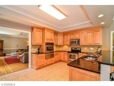 Kitchen - Tile floor, granite counters, maple cabinets, two ovens