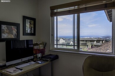 Similar ocean views are visible from the other bed