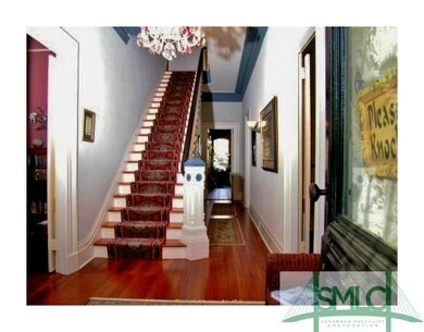 Foyer. The foyer has a sweeping stairway to the se