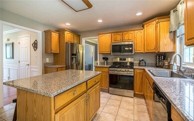 Glistening granite countertops are well appreciated.