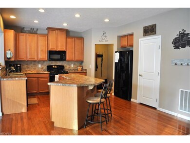 The home also offers a large pantry and mudroom which leads to the attached garage.