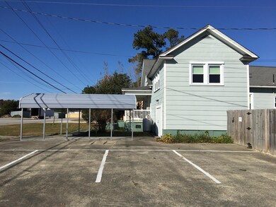 Parking spaces, garage, back yard