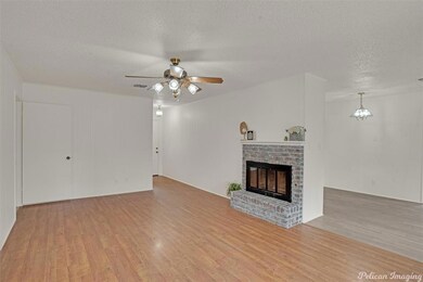 Living room with gas starter, wood burning firepla