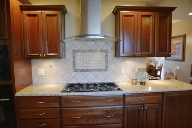Gas Cooktop & marble/tile backsplash