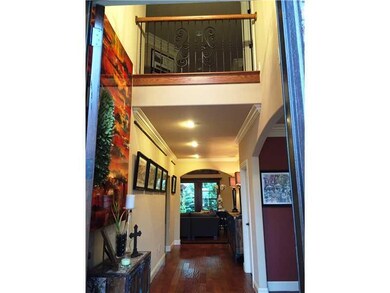 Other. Grand entry foyer with balcony above from loft.