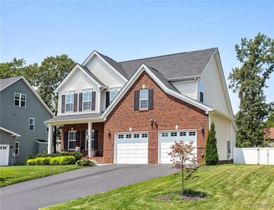 Exterior front of the home view to the 24X21 attac