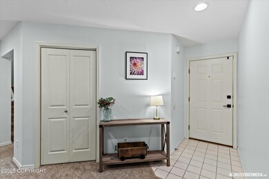 Front Entry with tile floors and closet