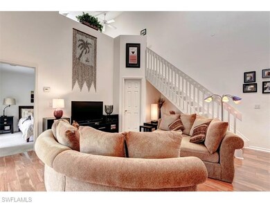 Another view of the living room shows access to th