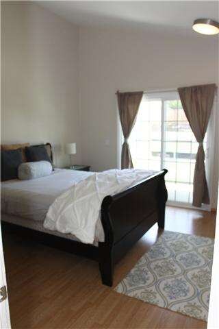 Master bedroom with larger balcony.