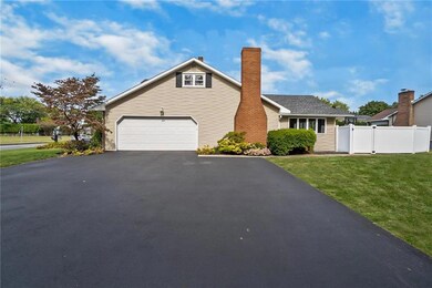 2 car garage and an oversized driveway for easy tu