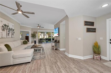 Great room featuring ceiling fan, light wood-style
