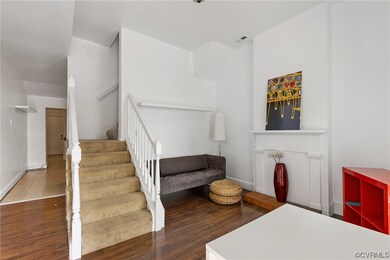 Staircase with hardwood flooring