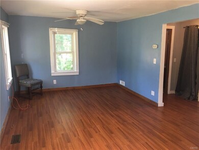 Front living room/family room with new paint, wind