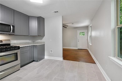 View of the Kitchen, Living Room and Foyer in the