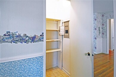 Pantry and broom closet in the kitchen with updated electrical box