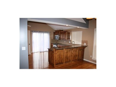 The kitchen offers a breakfast bar