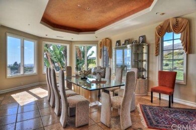 formal dining room with sit down ocean views and f