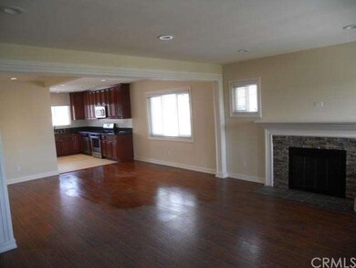 Looking into the dining room and kitchen, very ope