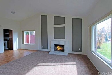 Warm and cozy living room area with plenty of sunl