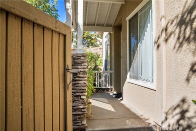 Gated entrance and front porch.