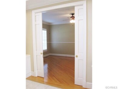 Living Room off the Foyer has gorgeous Pocket Door