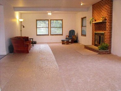 Living Room. 3 Large windows allow plenty of natur