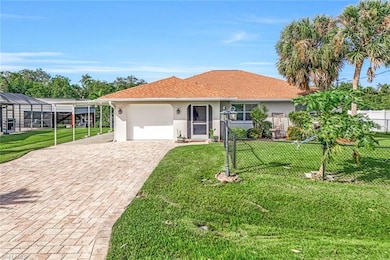 View of front of property with a garage and a fron