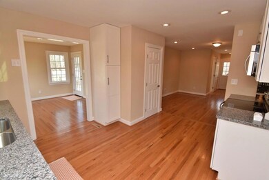 New hardwood floors and recessed lighting.  Kitchen has pantry