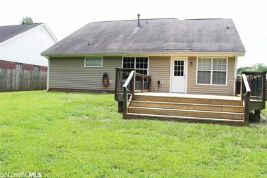 Picturesque backyard is completely privacy fenced