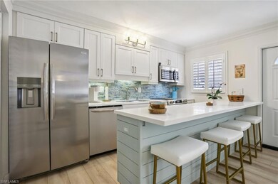 Kitchen featuring light hardwood / wood-style floo