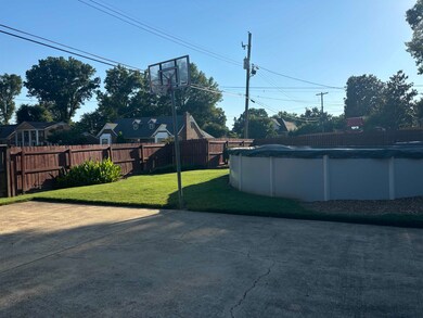 View of yard with a covered pool