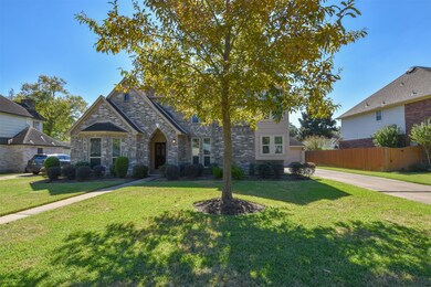 Beautiful front elevation with arched brick entry