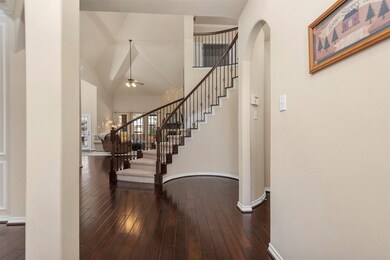 Stunning curved staircase.