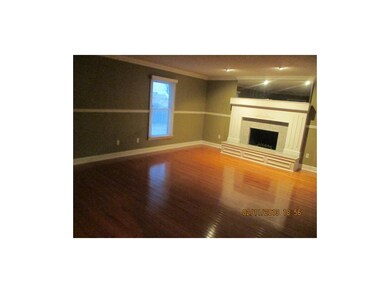 New Hardwoods and Fireplace in Greatroom