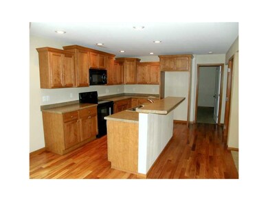 Kitchen. Cherry Cabinets with Breakfast Bar