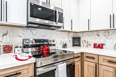 Kitchen featuring appliances with stainless steel