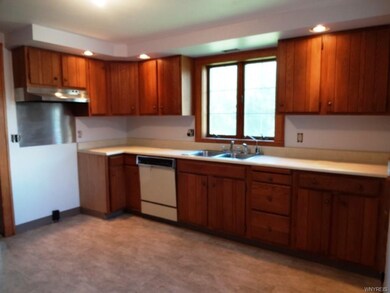 Freshly painted Country Kitchen with newer vinyl f
